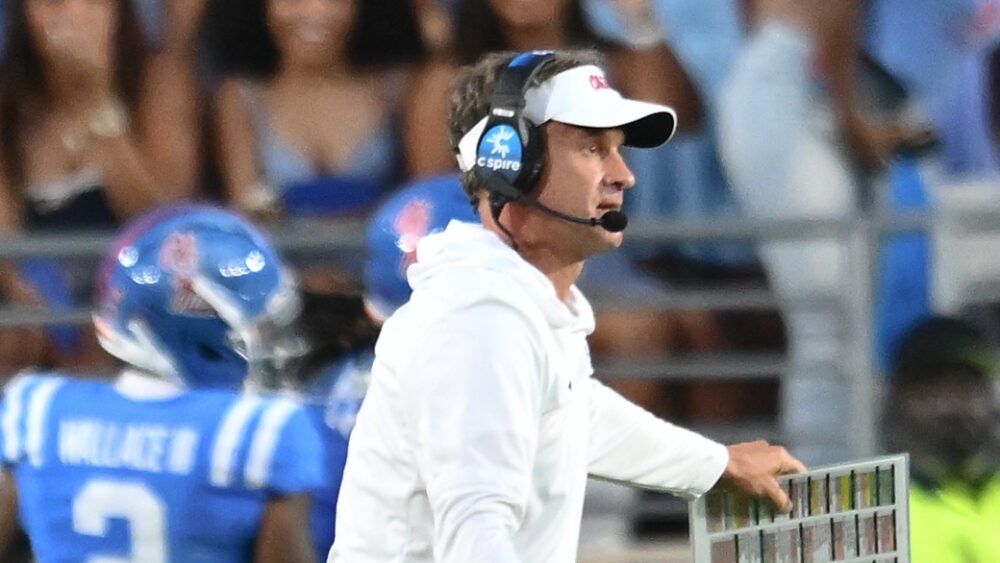 Ole Miss Rebels coach Lane Kiffin on the sidelines in a game against the Arkansas Razorbacks
