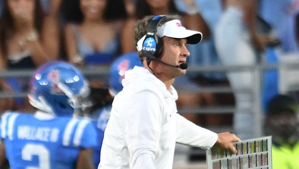 Ole Miss Rebels coach Lane Kiffin on the sidelines in a game against the Arkansas Razorbacks